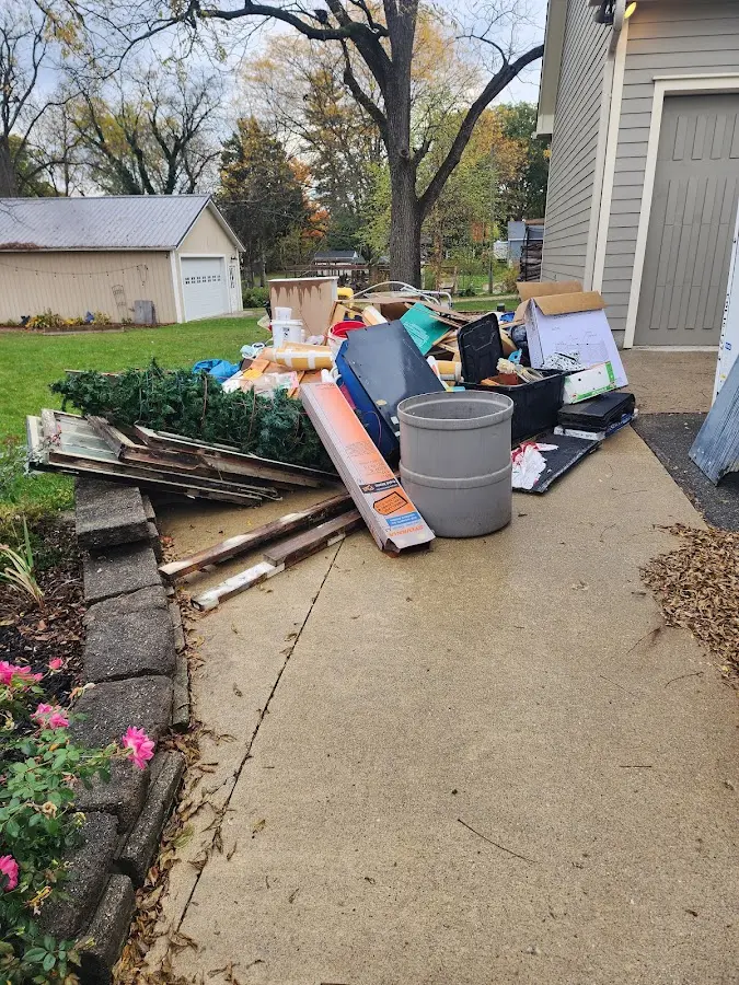 Dumpster being loaded with debris for Commercial Dumpster Rental in Upper Southampton